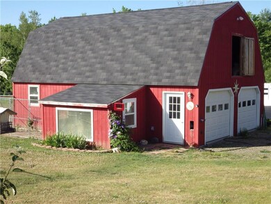 Two story barn with room above with...