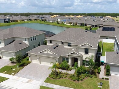 Exterior Front With Water View of Pond in Rear