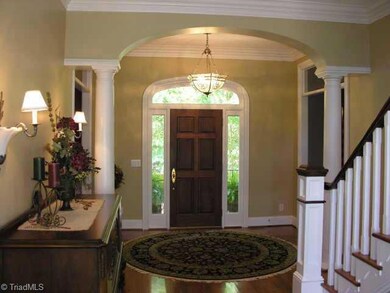 Other. Gracious entrance runs from the front of the home to the back.