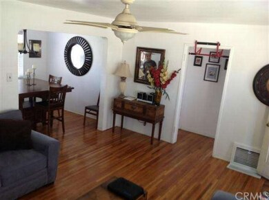 Living room facing the dining room and hallway