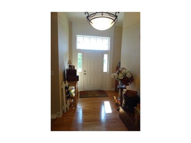 Grand Entry with hardwood floors