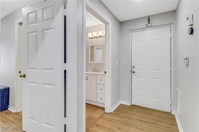 Entrance foyer featuring light wood-style flooring