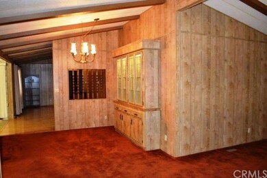 An opposing view of the dining area shows the fami