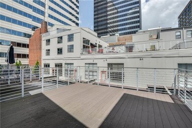 The balcony looks towards the Bank of America Building as well as the Titans Stadium.