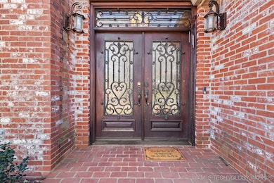 Entrance to property with french doors and brick s