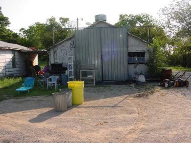 Exterior Front. METAL SHOP BUILDING