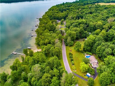 Shared owner of 11 acre Common Area with lake rights on lake side of road.