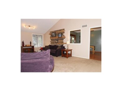 Living Room Opens to Dining and Kitchen