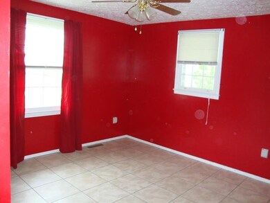 Master Bedroom has large closet and lighted paddle