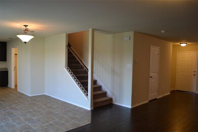 Unfurnished room featuring wood-type flooring