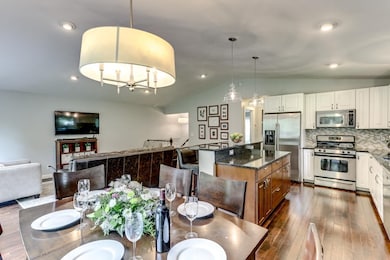 Matching chandeliers define the space perfectly.