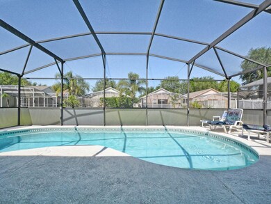 Relaxing, screen enclosed swimming pool
