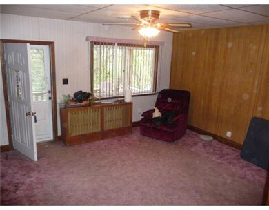 Living Room. Living room has ceiling fan.
