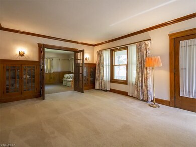 French doors from the formal living room lead into