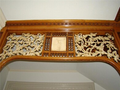 This one-of-a-kind archway greets...