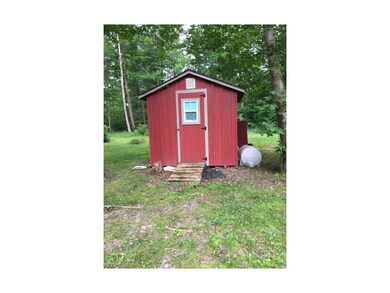 Detached bathroom with toilet, sink and heat.  Wat