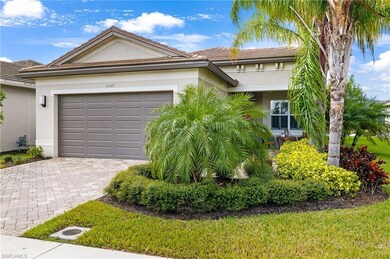 Front exterior of home. Upgraded pavers in drive and rear lanai/pool area, also.