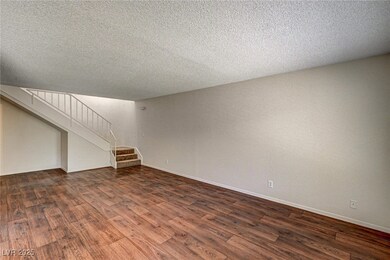 Living room with luxury vinyl flooring.