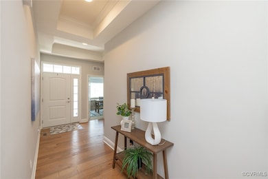 Entryway with ornamental molding, engineered hardw