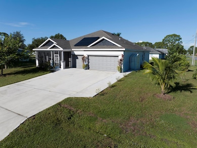 1302 SE Naples Ln, Port Saint Lucie, FL 34983 - photo 2