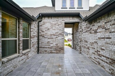 Cozy front patio for relaxing afternoons.