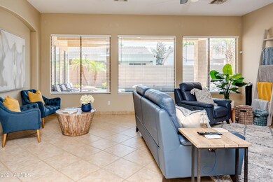 Oversized family room with pool view