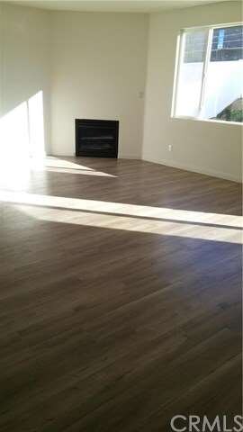 Family Room w/scotch walnut laminate wood flooring