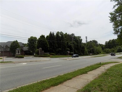Road frontage with sidewalk.