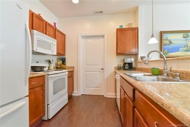 Well equipped kitchen with Maple cabinets, spaciou