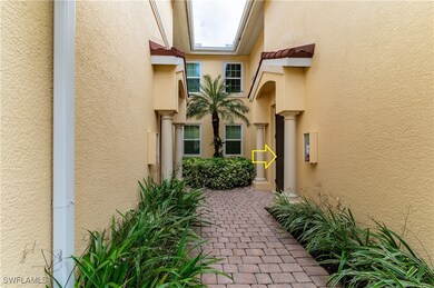 Doorway to property with stucco siding