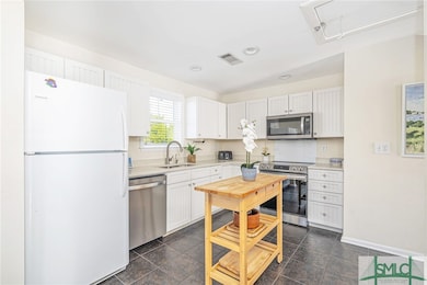 Upstairs 2BR/2BA Unit - Kitchen