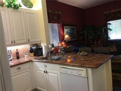 Kitchen opens to Family Room