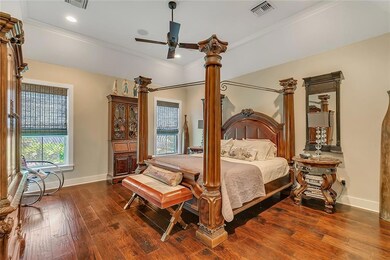 Large Master Bedroom with gorgeous hardwood floori