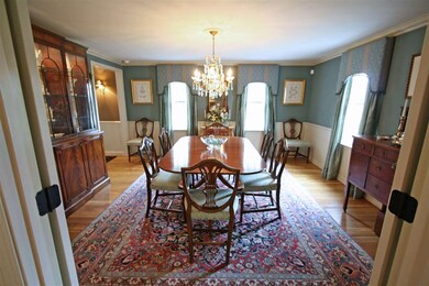 Hardwood floor, antique chandelier, French doors t