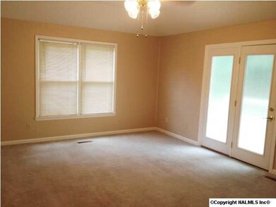 GREATROOM HAS FRENCH DOORS LEADING TO THE DECK.