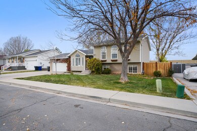 View of front of property with brick siding and driveway