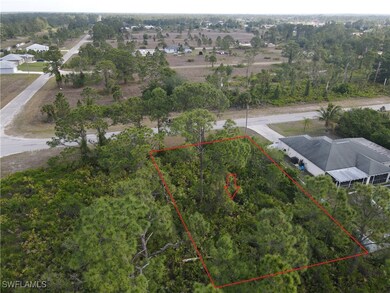Aerial overview of property's location featuring property parcel outlined