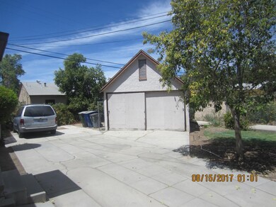 Detached 2-car garage behind main home