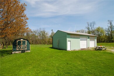 Large Pole Barn plus storage Shed
