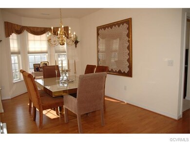 Formal Dining room with bay window, wood laminate 