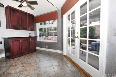 Kitchen dining area and French doors to covered patio.