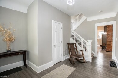 Access to the first floor half bathroom in foyer