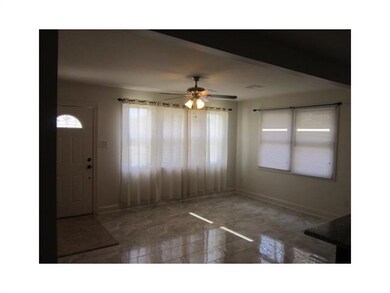 Living Room. Porcelin floors, all new light fixtur