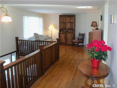 Living Room. Open staircase with formal living roo