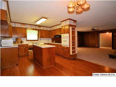Kitchen has lots of space and opens to greatroom a