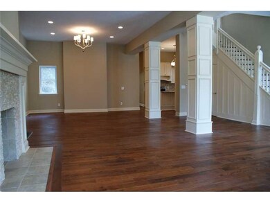Living Room. Antique, hand-scraped floors grace th