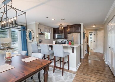 Beautifully updated Unit with Fresh Paint - no popcorn ceilings ~ Updates Flooring - Lighting - Hardware!