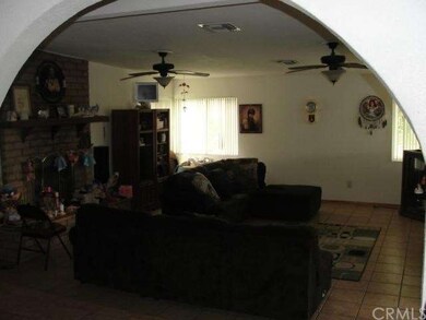 Large family room addition with tile flooring.
