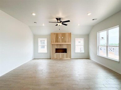 Unfurnished living room with light wood finished f