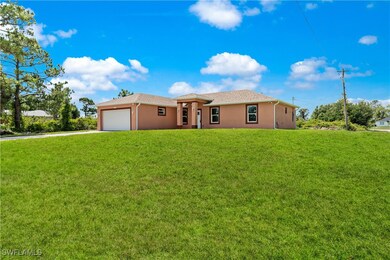 Single story home featuring stucco siding, drivewa